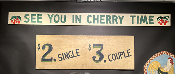 Victor Weinblatt of South Hadley, Massachusetts, was new to Antiques in Manchester this year. The “See you in Cherry Time” sign, 1940s-50s, was $795, and the “$2. Single $3. Couple” sign, referring to occupancy in lakeside summer cabins in upstate New York, was $1500.