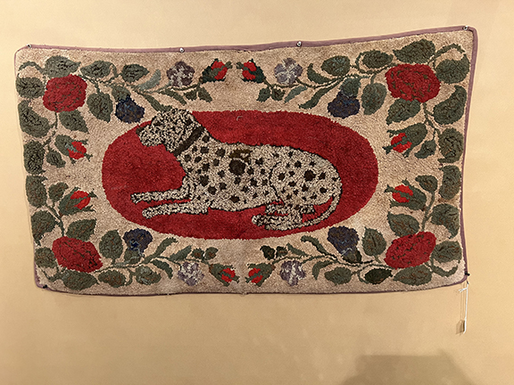 The colorful spotted dog hooked rug, late 19th/early 20th century, was $2300 from Hilary and Paulette Nolan of Falmouth, Massachusetts.