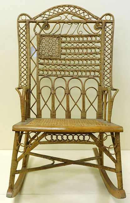 lot 353  -  Wicker rocking chair, probably made for the 1876 centennial exhibition in Philadelphia. 