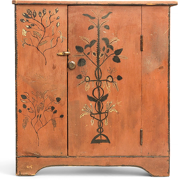 Decorated diminutive cupboard in pine, possibly Ohio, mid-19th century, having a single-plank door, original red paint with unusual floral and vining designs, 36