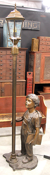 Chris Smith of Circa 1855, Lebanon, Ohio, had nicknamed the boy “Jimmy” in this electrified bronze of a lad wearing overalls and a backward baseball-style cap while standing next to a street lamp. It was said to have a connection to a library in Tulsa, Oklahoma, probably as an interior piece of artwork, but the correlation wasn’t clear. Standing 80