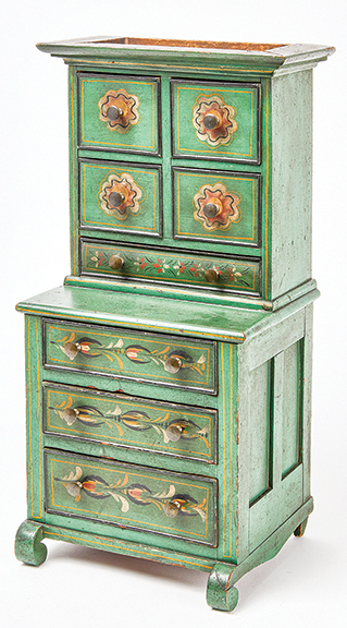 Granville Harrison Pool (1822-1915) of Grayson County, Virginia, would have been about eight years old when this miniature cupboard in green paint with polychrome decoration was made. Either he was very precocious or he was the lucky recipient of an exceptional well-constructed child-size piece, 19¼