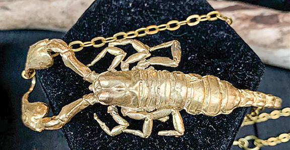 Cast from a real scorpion, this brass choker was fashioned by Christie Joy of Chicago, whose online business is called Paper Stranger. She had pieces of jewelry of other insects but said they were from models she made because most don’t cast well. A collector since childhood, she priced the necklace at $220.
