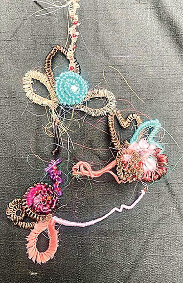 Flower motifs created by gimp wrapping were the products of a workshop taught by Karen Bachmann of New York. She brought bundles of horsehair to be wound around needles with wire to evoke the Victorian practice of hairwork.