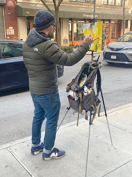 Bob Jones was painting outside the Outsider Art Fair. He was in the same spot last year.
