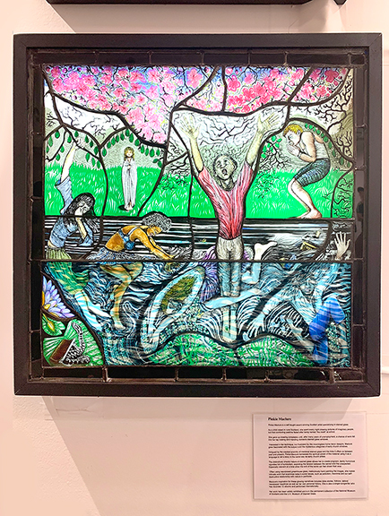 Pinkie Maclure is a self-taught award-winning Scottish artist specializing in stained glass. Seen here is The River, 25