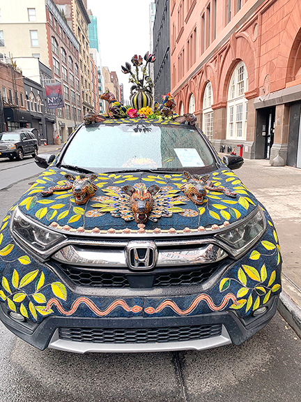 Nancy Josephson, bead artist extraordinaire, shows her mixed-media work in the booth of Duff Lindsay of Lindsay Gallery, Columbus, Ohio. Her Honda, which she said she drives to the supermarket, was parked at the entrance to the Outsider Art Fair. It commanded lots of attention and was photographed and shared by visitors and passersby.