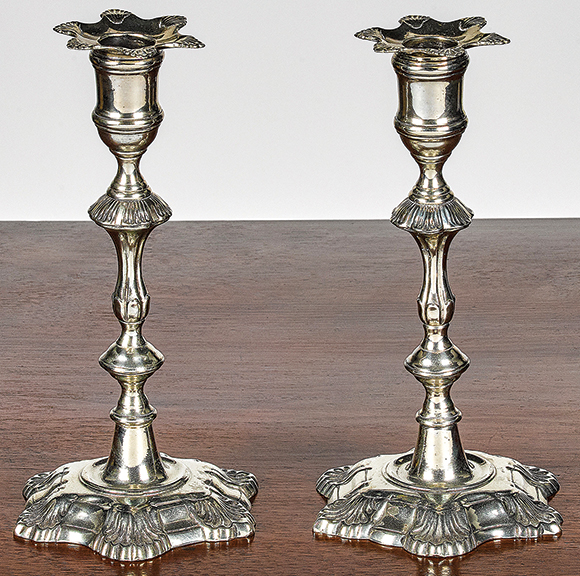 Pair of English paktong candlesticks, mid-18th century, with six-shell bobeches and bases, 8¾