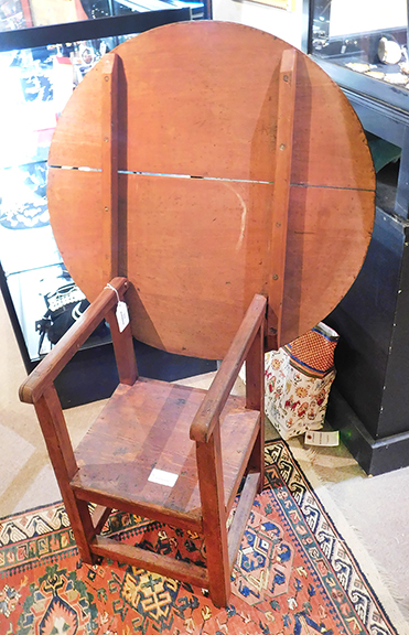 The rare child-size pine chair table, measuring only 24