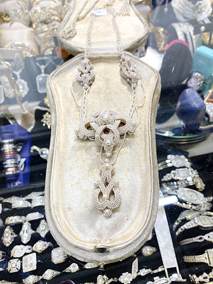 Asked to show us something remarkable in her inventory, seller Beth Pagel of Bel Air Jewelry, who exhibits at the Michiana Antique Mall, Niles, Michigan, introduced the early 18th-century wedding necklace of seed pearls, mother-of-pearl, and horsehair, tagged $2800. 