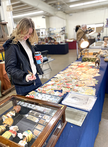 From tots with their parents to post-teen attendees, younger shoppers at the show were a great positive sign. Twenty-five-year-old Julia Hedlak of Wind Point, Wisconsin, spent a good amount of time perusing a display of vintage valentines for a perfect example. Her goal was to find a special card for her boyfriend. As she put it, “Why pay over five dollars for a Hallmark card when you can find a vintage one with timely appeal for a dollar?” In short order, she found an unusual World War II theme card with a handwritten message on the back.