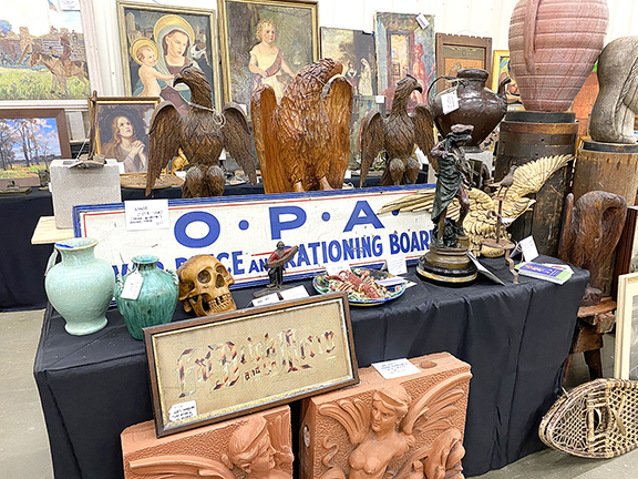 Robert Lutz of Red Eye Antiques, Lindenhurst, Illinois, once had Chicago shops in two locations, but this was his first show after a 26-year hiatus from selling at shows. He added that on Friday, the first day of the show, he sold 14 eagles, most made of cast iron and all dating pre-1900, with the top price at $2300. Seen in his booth around noon of the second day, eagles that remained included a pair of 21